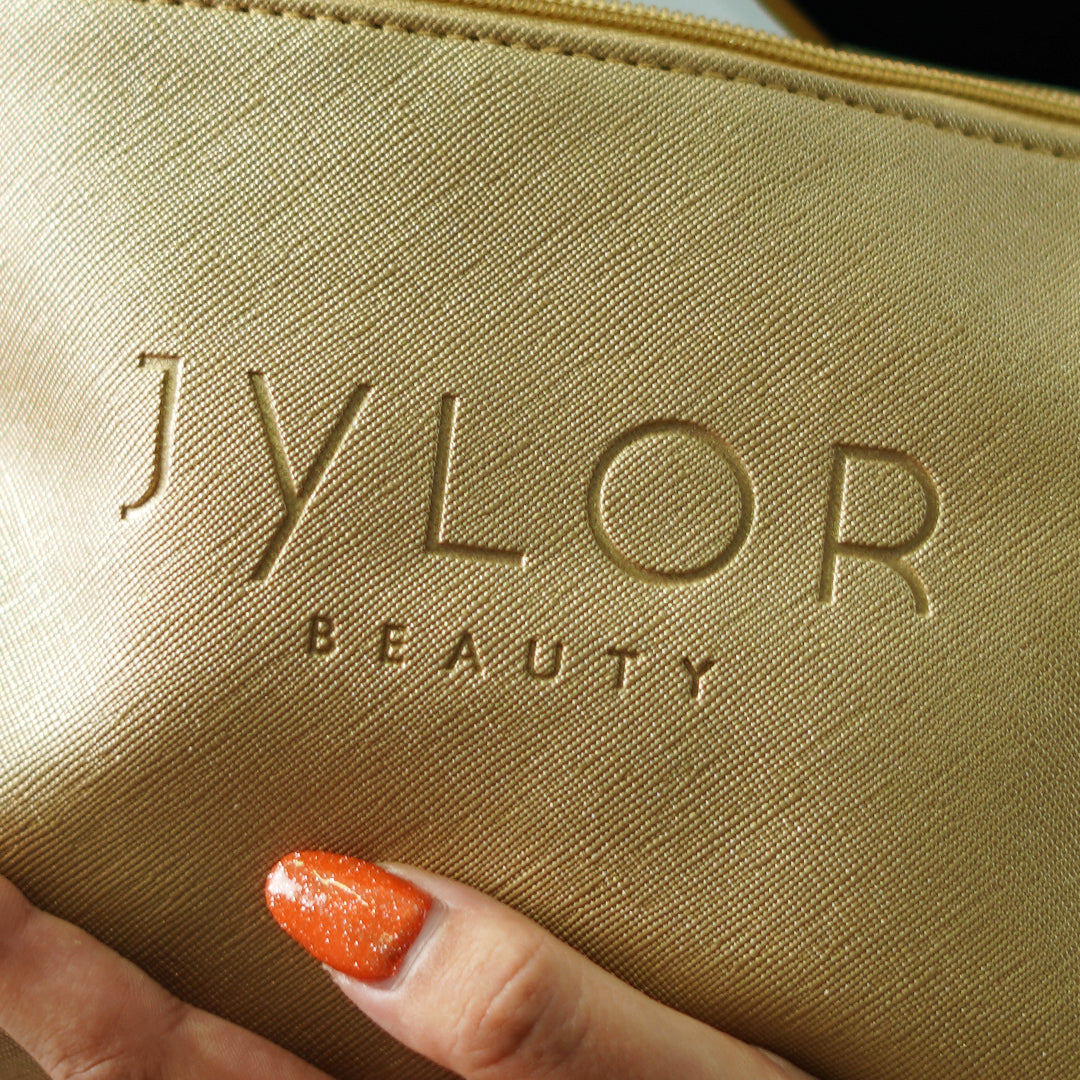 Golden beauty pouch
